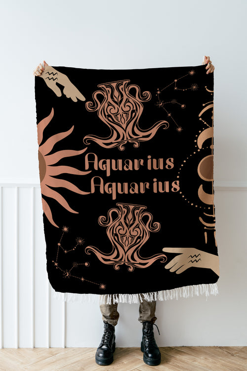 Aquarius Aquarius woven throw blanket displayed indoors
