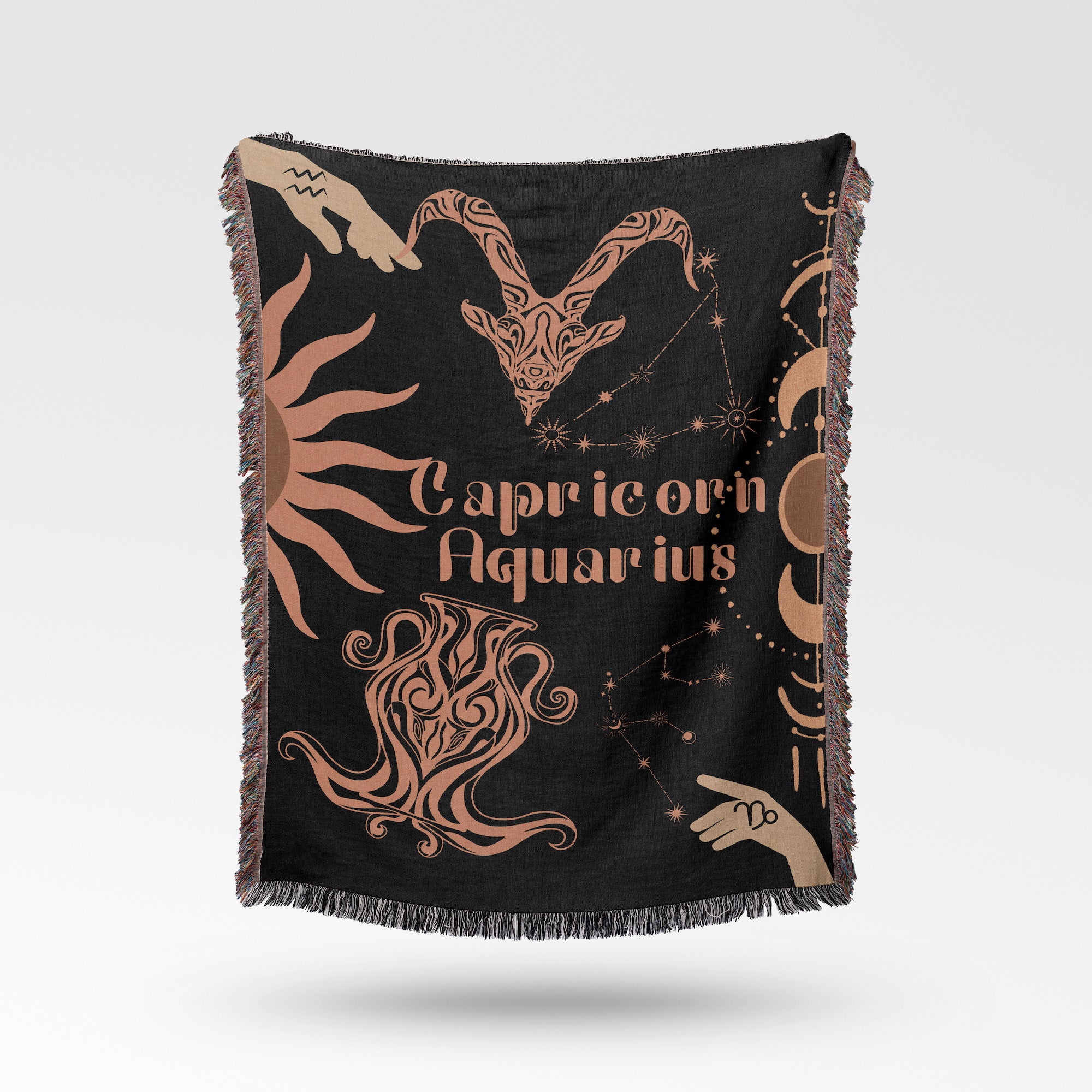 Woven tapestry throw blanket featuring the Aquarius and Capricorn zodiac symbols. Perfect for astrology enthusiasts, this cotton throw blanket adds a touch of boho style and celestial charm to your home decor.