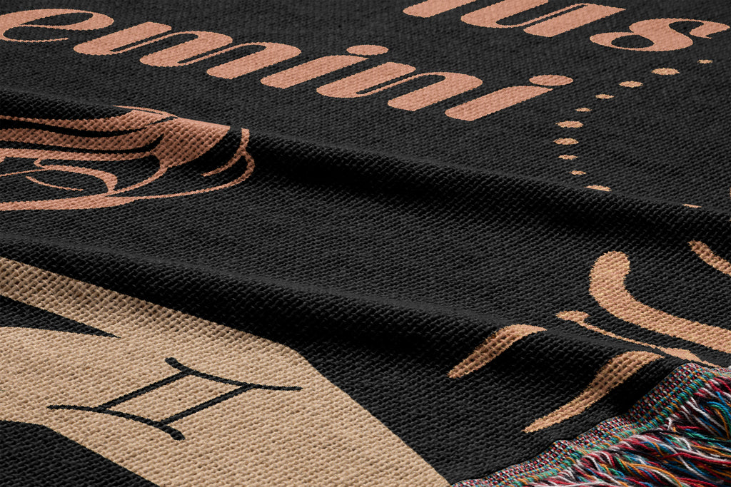 Woven tapestry throw blanket featuring the Aquarius and Gemini zodiac symbols. Perfect for astrology enthusiasts, this cotton throw blanket adds a touch of boho style and celestial charm to your home decor.