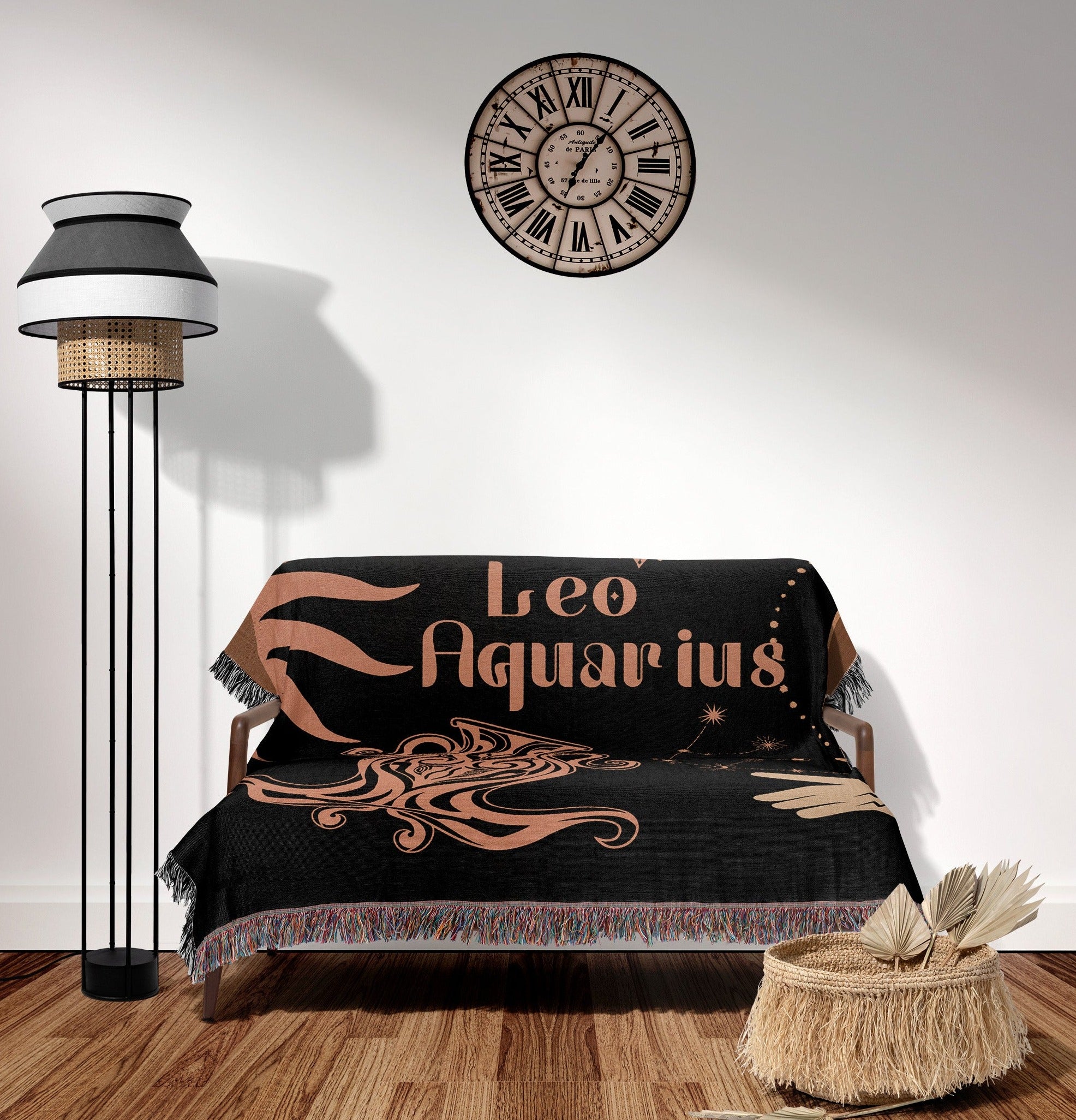 Woven tapestry throw blanket featuring the Aquarius and Leo zodiac symbols. Perfect for astrology enthusiasts, this cotton throw blanket adds a touch of boho style and celestial charm to your home decor.