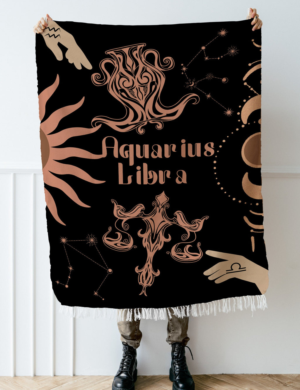 Woven tapestry throw blanket featuring the Aquarius and Libra zodiac symbols. Perfect for astrology enthusiasts, this cotton throw blanket adds a touch of boho style and celestial charm to your home decor.