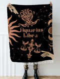 Woven tapestry throw blanket featuring the Aquarius and Libra zodiac symbols. Perfect for astrology enthusiasts, this cotton throw blanket adds a touch of boho style and celestial charm to your home decor.