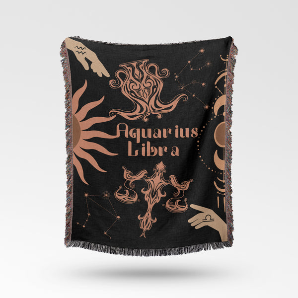 Woven tapestry throw blanket featuring the Aquarius and Libra zodiac symbols. Perfect for astrology enthusiasts, this cotton throw blanket adds a touch of boho style and celestial charm to your home decor.