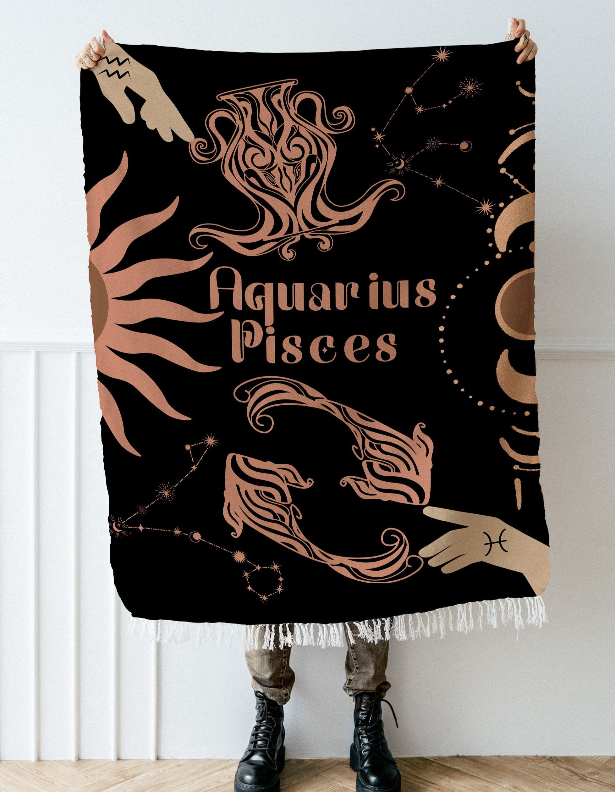 Woven tapestry throw blanket featuring the Aquarius and Pisces zodiac symbols. Perfect for astrology enthusiasts, this cotton throw blanket adds a touch of boho style and celestial charm to your home decor.
