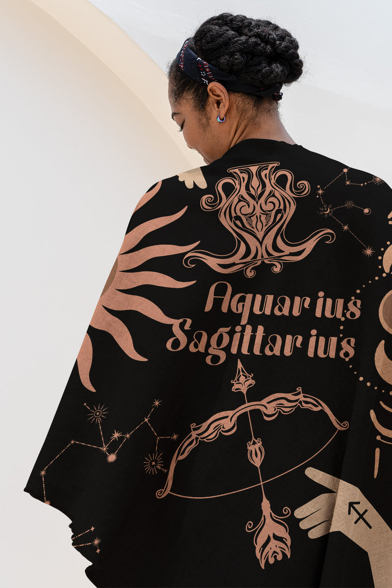 Woven tapestry throw blanket featuring the Aquarius and Sagittarius zodiac symbols. Perfect for astrology enthusiasts, this cotton throw blanket adds a touch of boho style and celestial charm to your home decor.