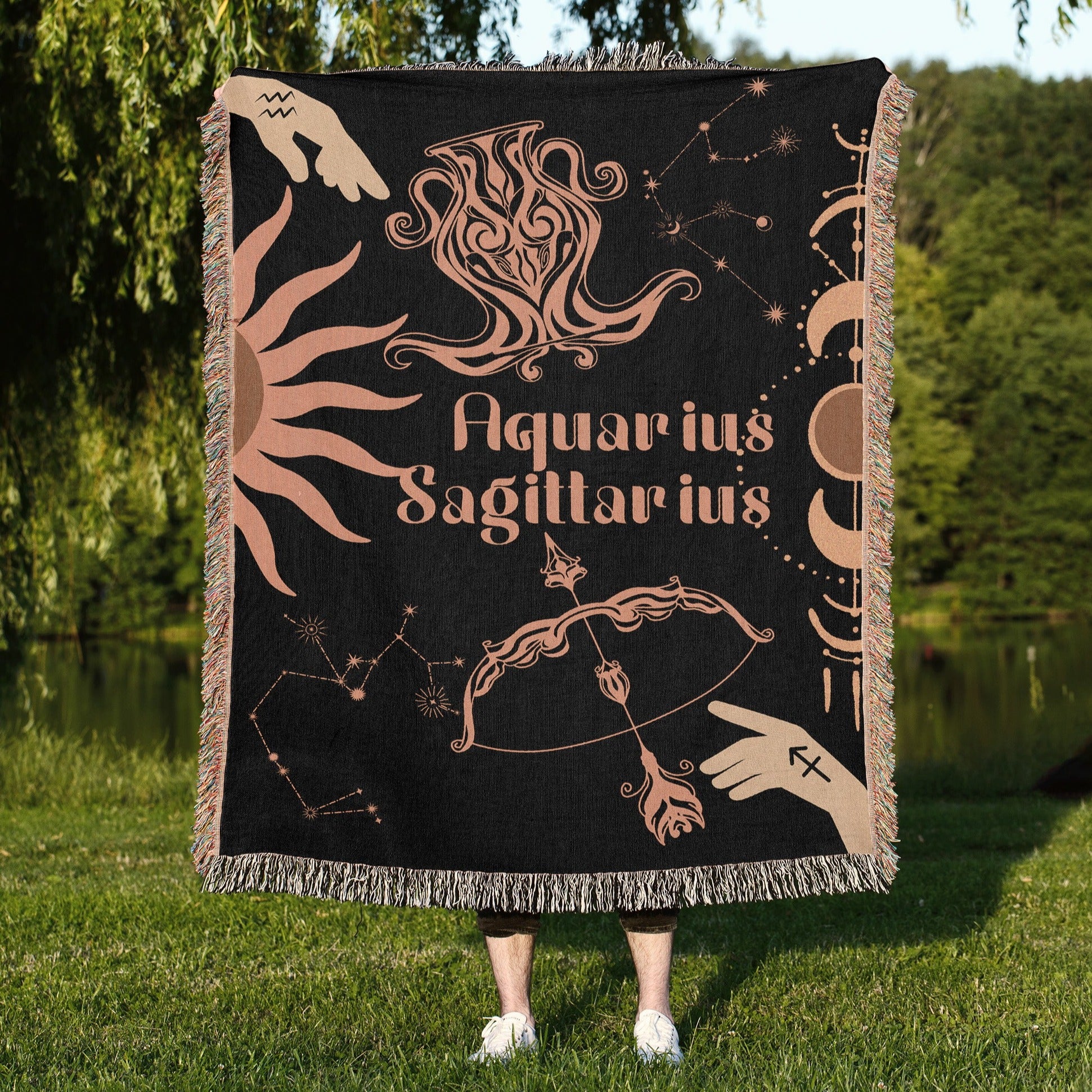 Woven tapestry throw blanket featuring the Aquarius and Sagittarius zodiac symbols. Perfect for astrology enthusiasts, this cotton throw blanket adds a touch of boho style and celestial charm to your home decor.