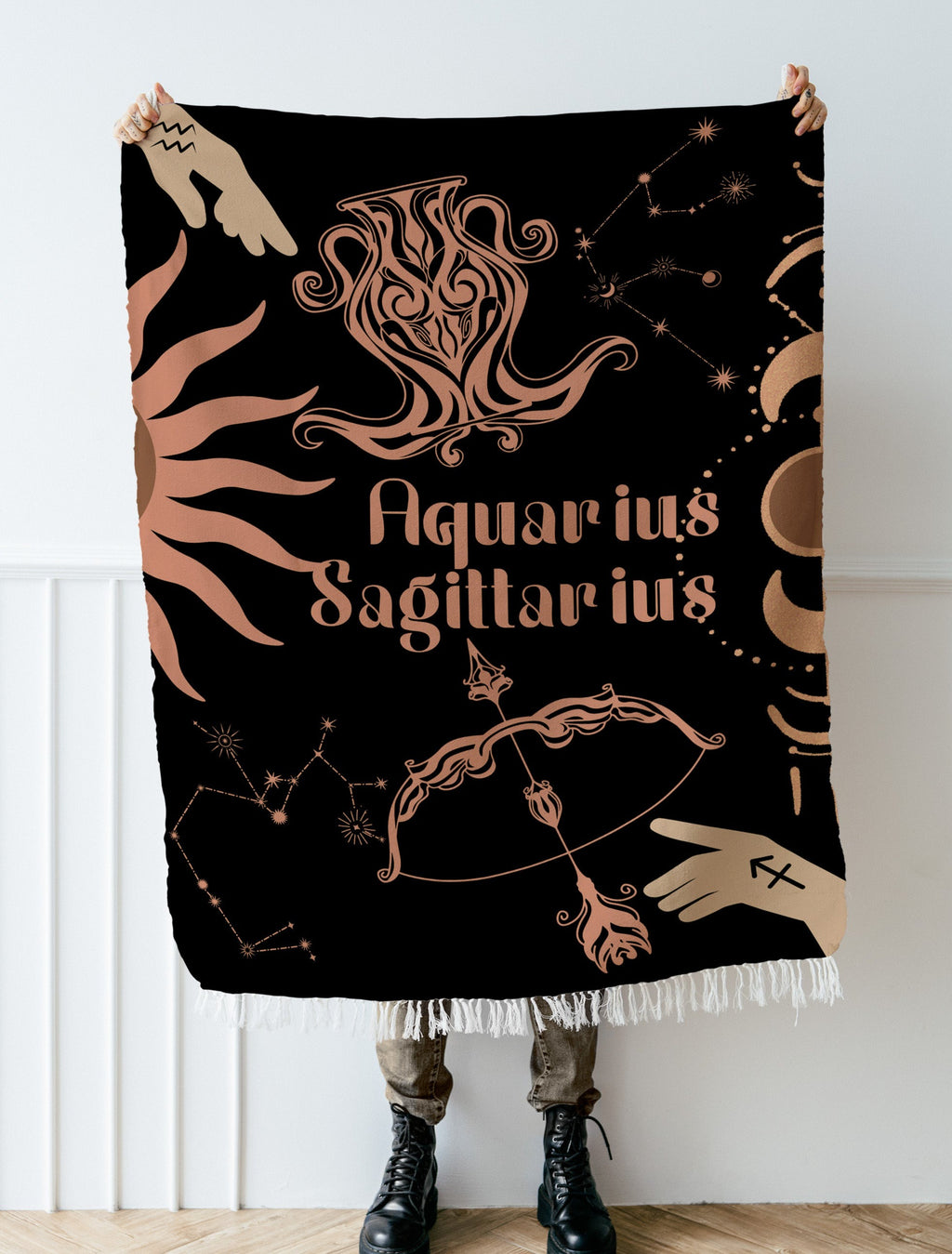 Woven tapestry throw blanket featuring the Aquarius and Sagittarius zodiac symbols. Perfect for astrology enthusiasts, this cotton throw blanket adds a touch of boho style and celestial charm to your home decor.