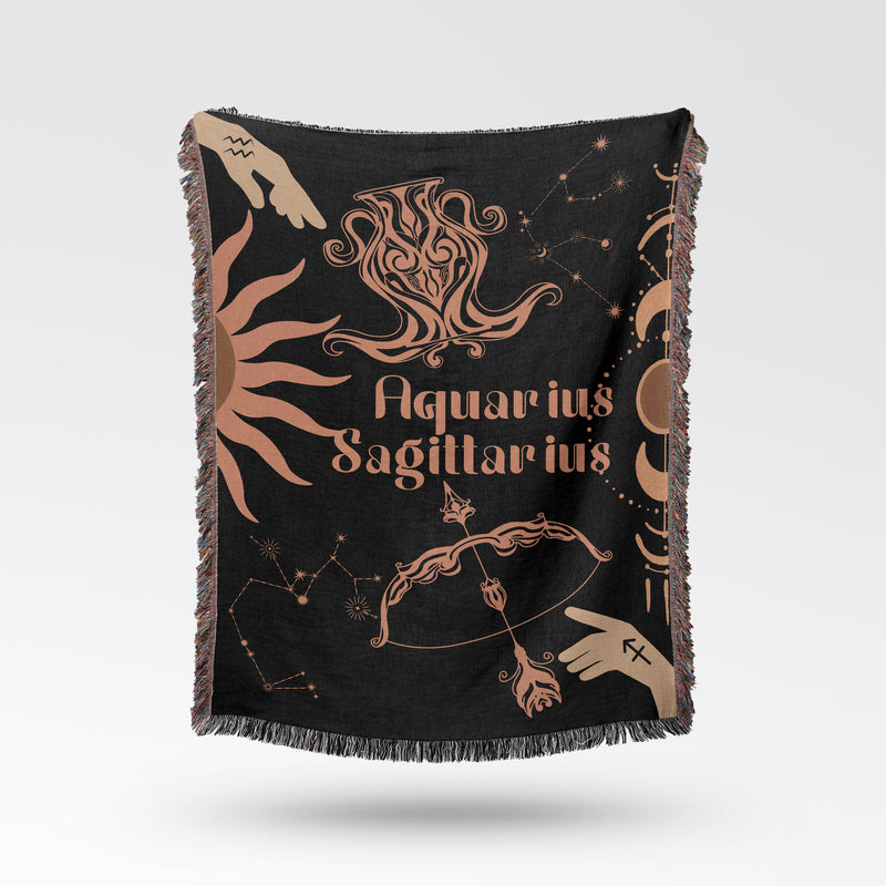 Woven tapestry throw blanket featuring the Aquarius and Sagittarius zodiac symbols. Perfect for astrology enthusiasts, this cotton throw blanket adds a touch of boho style and celestial charm to your home decor.