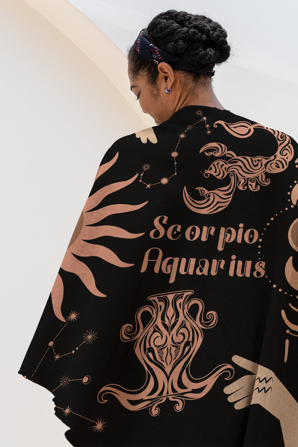 Woven tapestry throw blanket featuring the Aquarius and Scorpio zodiac symbols. Perfect for astrology enthusiasts, this cotton throw blanket adds a touch of boho style and celestial charm to your home decor.