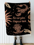 Woven tapestry throw blanket featuring the Aquarius and Scorpio zodiac symbols. Perfect for astrology enthusiasts, this cotton throw blanket adds a touch of boho style and celestial charm to your home decor.