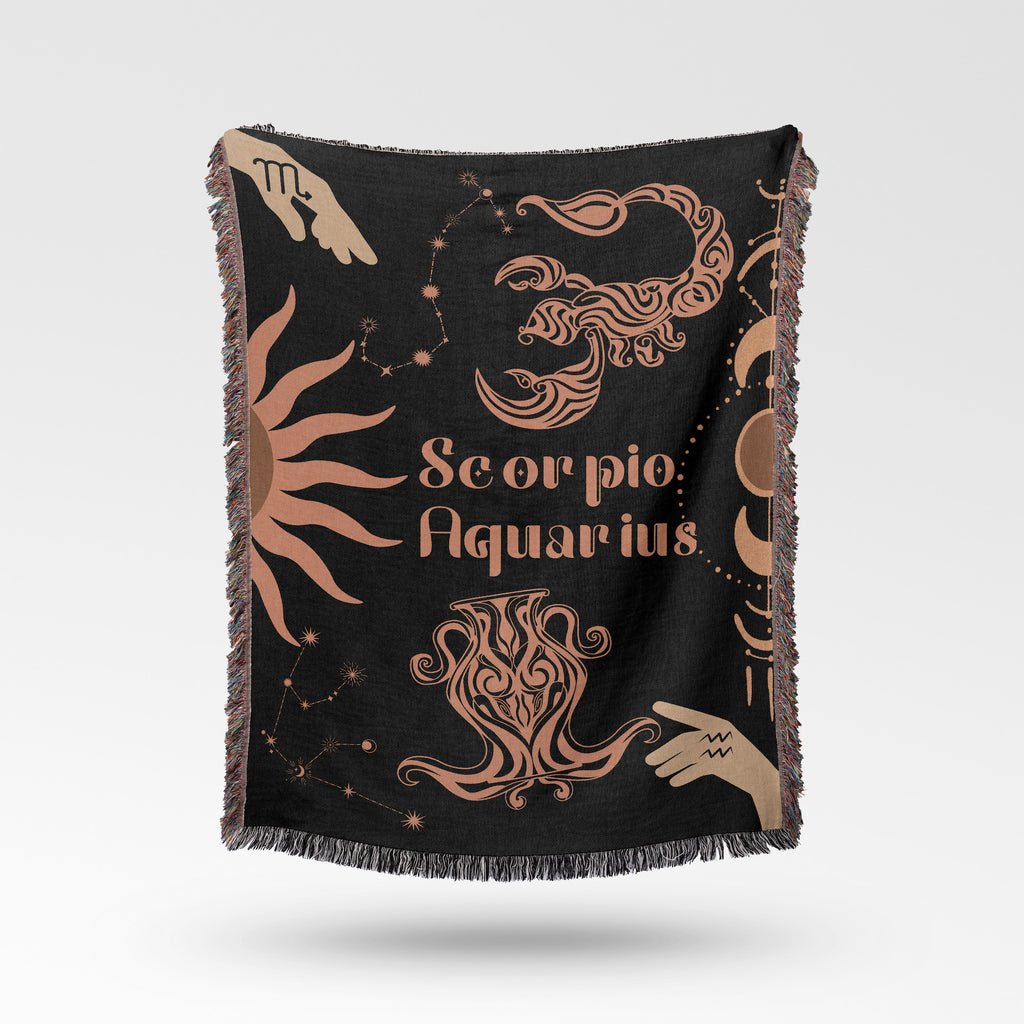 Woven tapestry throw blanket featuring the Aquarius and Scorpio zodiac symbols. Perfect for astrology enthusiasts, this cotton throw blanket adds a touch of boho style and celestial charm to your home decor.