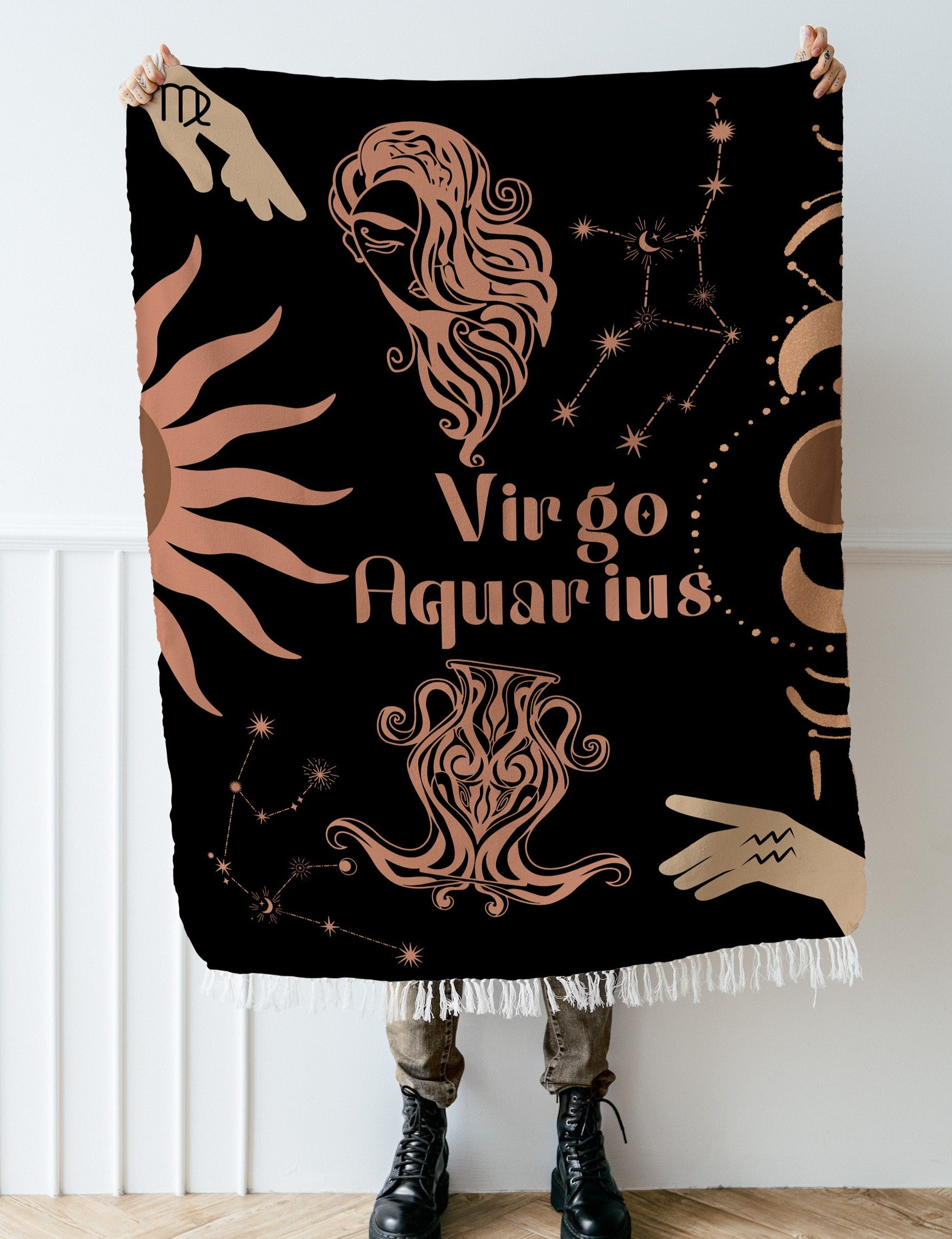 Woven tapestry throw blanket featuring the Aquarius and Virgo zodiac symbols. Perfect for astrology enthusiasts, this cotton throw blanket adds a touch of boho style and celestial charm to your home decor.