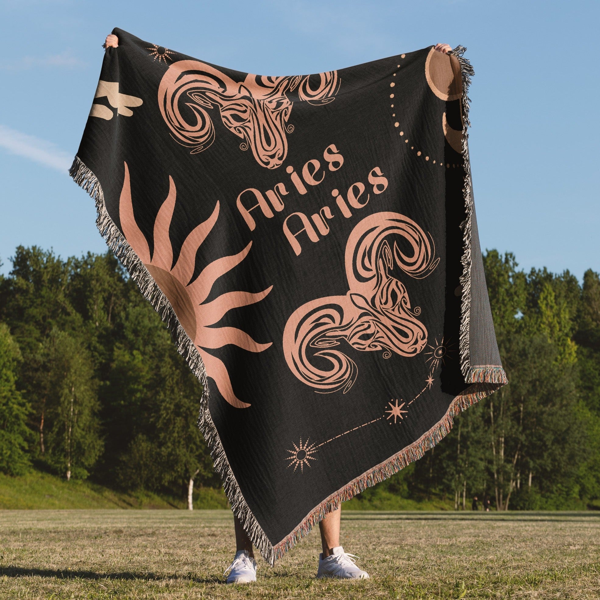 Woven tapestry throw blanket featuring the Aries and Aries zodiac symbols. Perfect for astrology enthusiasts, this cotton throw blanket adds a touch of boho style and celestial charm to your home decor.