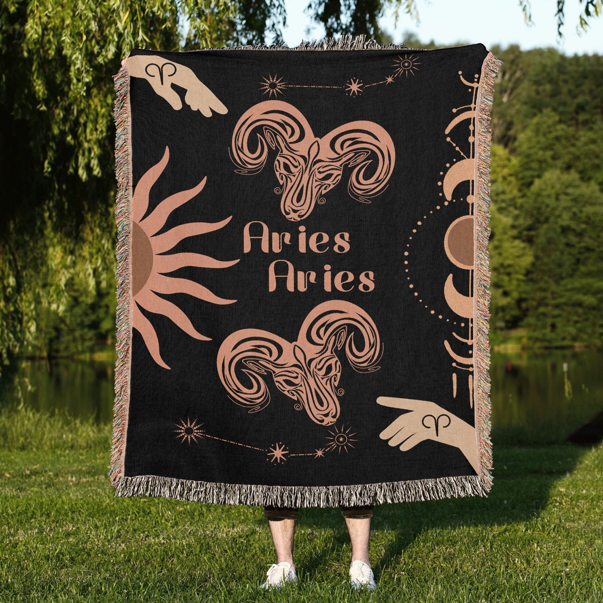 Woven tapestry throw blanket featuring the Aries and Aries zodiac symbols. Perfect for astrology enthusiasts, this cotton throw blanket adds a touch of boho style and celestial charm to your home decor.
