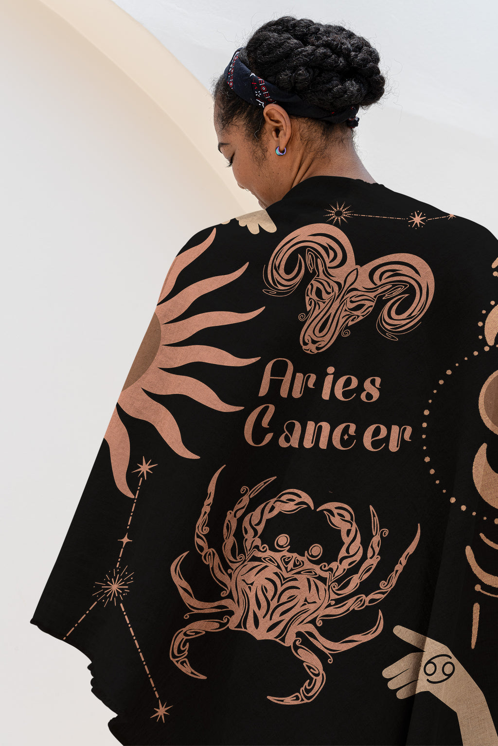 Woven tapestry throw blanket featuring the Aries and Cancer zodiac symbols. Perfect for astrology enthusiasts, this cotton throw blanket adds a touch of boho style and celestial charm to your home decor.