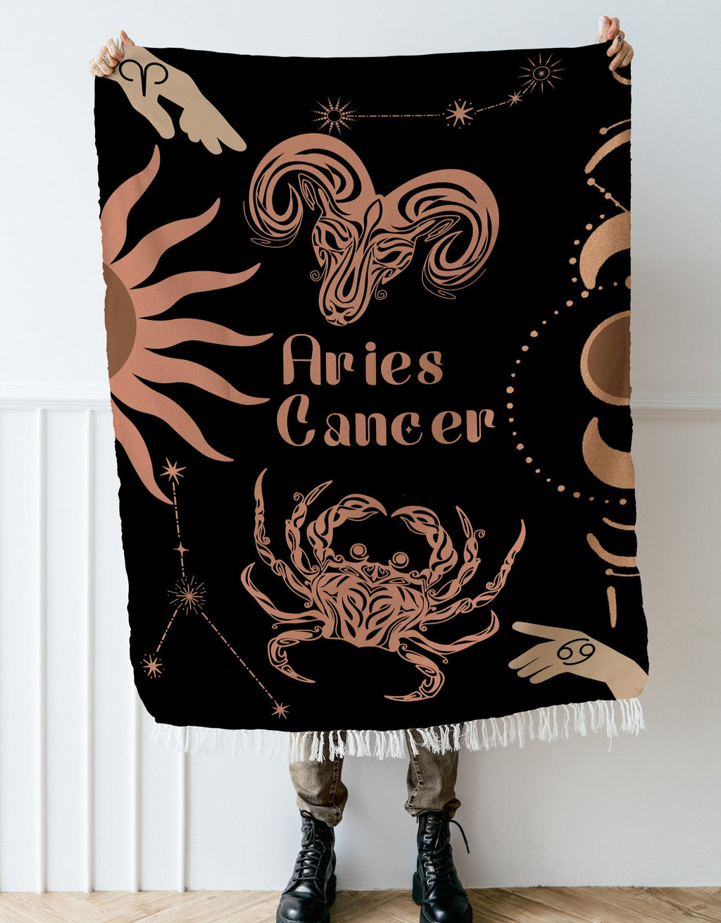 Woven tapestry throw blanket featuring the Aries and Cancer zodiac symbols. Perfect for astrology enthusiasts, this cotton throw blanket adds a touch of boho style and celestial charm to your home decor.