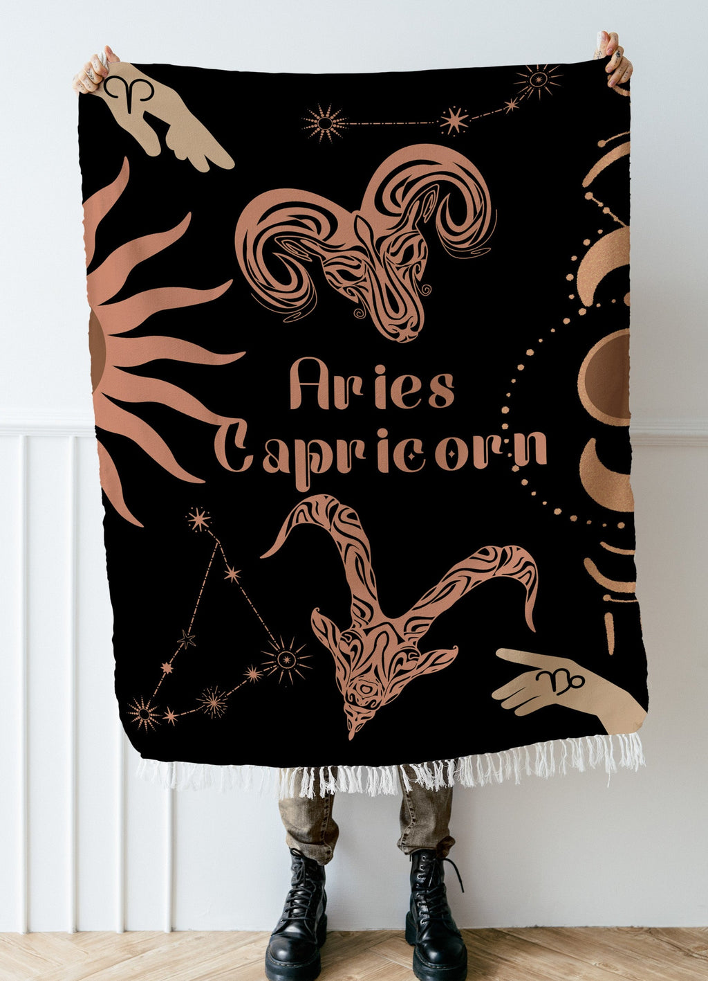Woven tapestry throw blanket featuring the Aries and Capricorn zodiac symbols. Perfect for astrology enthusiasts, this cotton throw blanket adds a touch of boho style and celestial charm to your home decor.