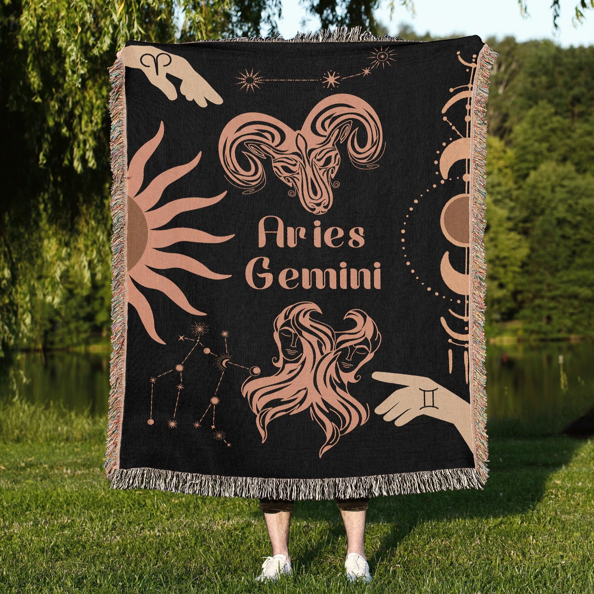Woven tapestry throw blanket featuring the Aries and Gemini zodiac symbols. Perfect for astrology enthusiasts, this cotton throw blanket adds a touch of boho style and celestial charm to your home decor.