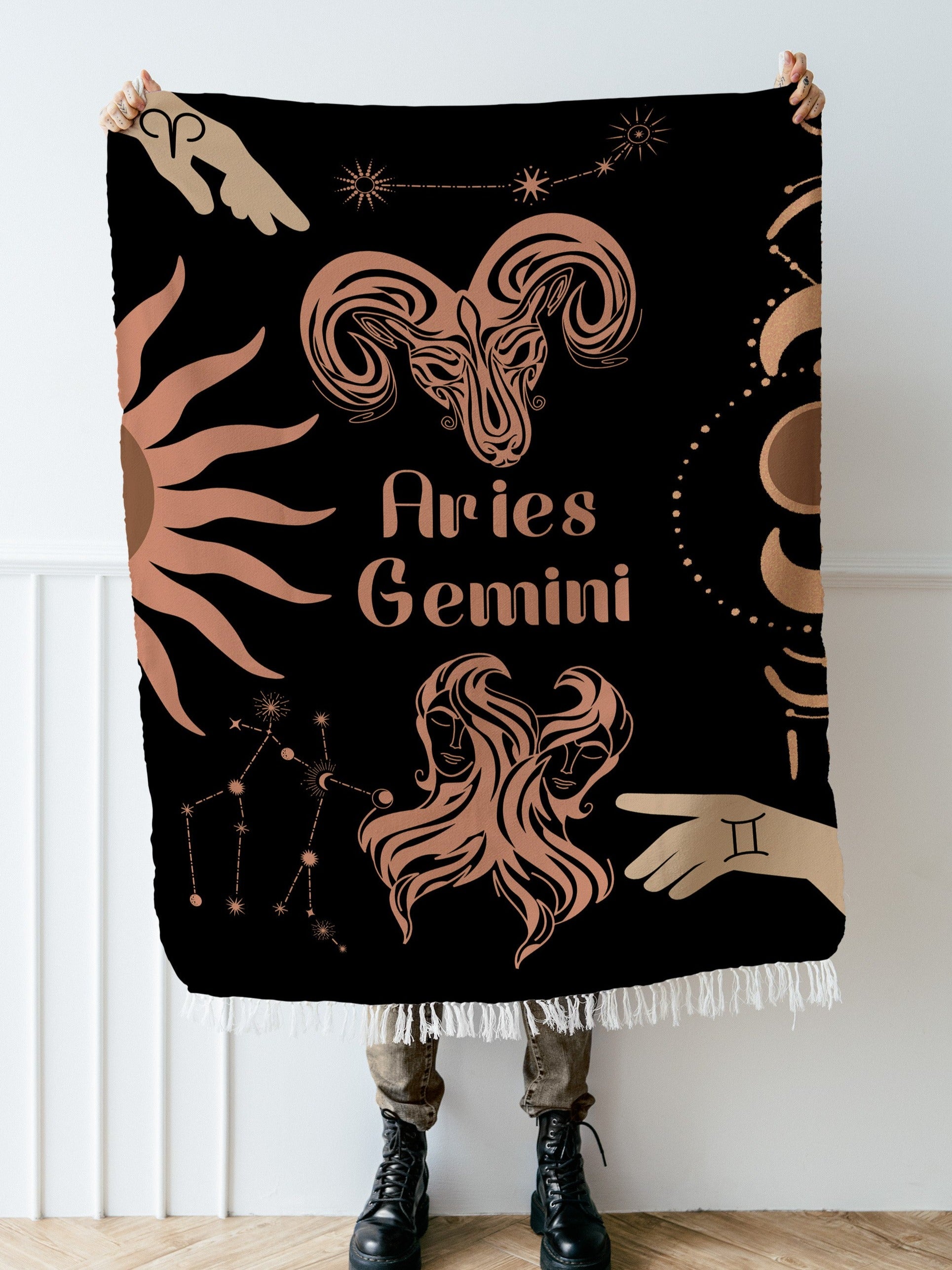 Woven tapestry throw blanket featuring the Aries and Gemini zodiac symbols. Perfect for astrology enthusiasts, this cotton throw blanket adds a touch of boho style and celestial charm to your home decor.