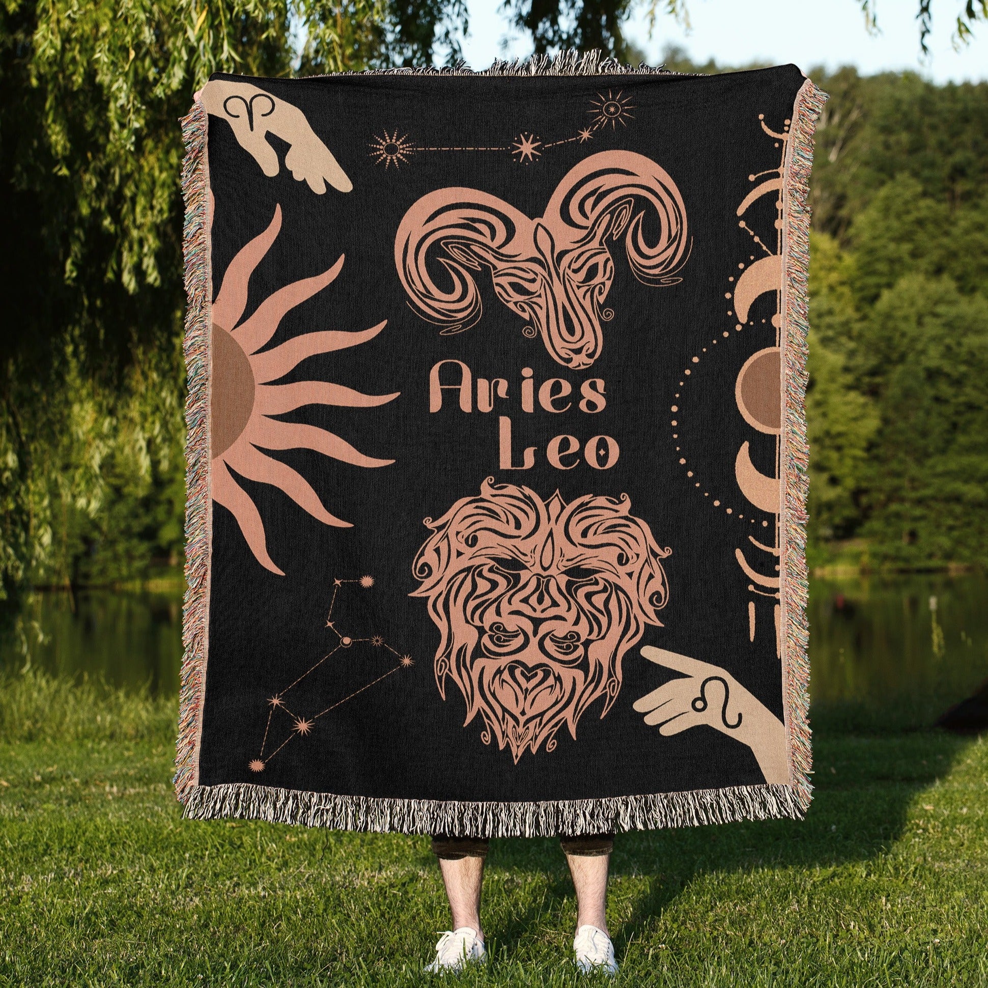 Woven tapestry throw blanket featuring the Aries and Leo zodiac symbols. Perfect for astrology enthusiasts, this cotton throw blanket adds a touch of boho style and celestial charm to your home decor.