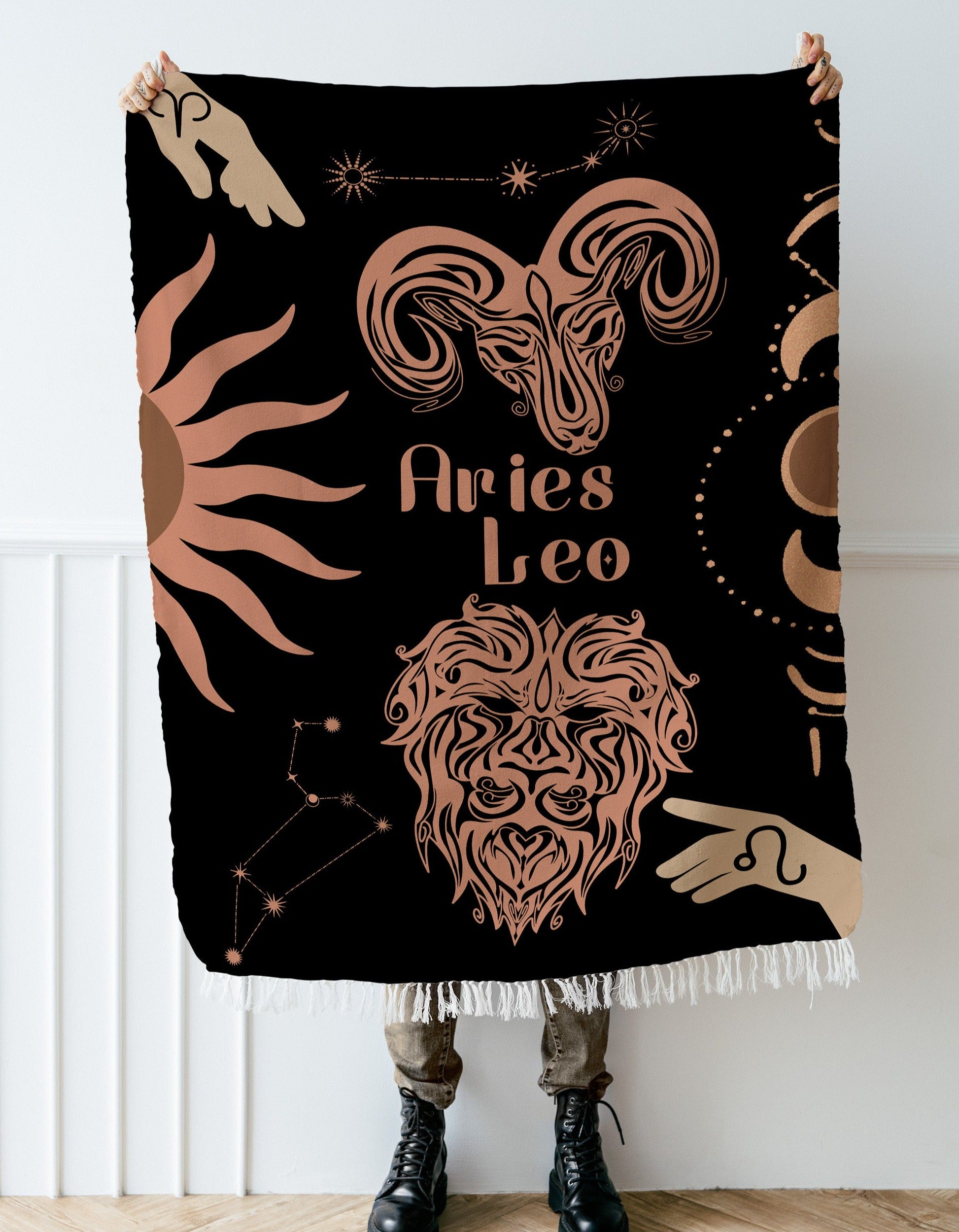 Woven tapestry throw blanket featuring the Aries and Leo zodiac symbols. Perfect for astrology enthusiasts, this cotton throw blanket adds a touch of boho style and celestial charm to your home decor.