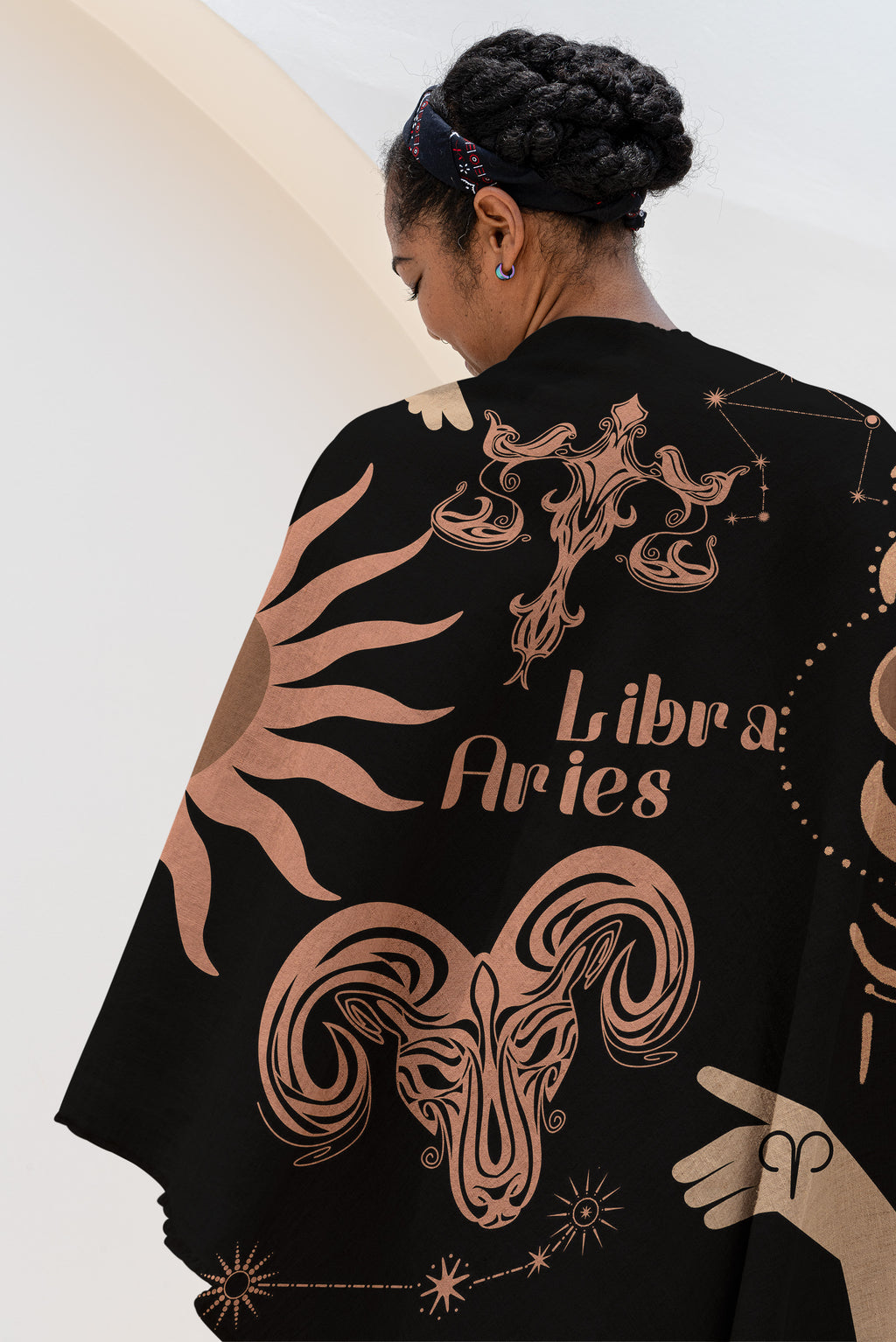 Woven tapestry throw blanket featuring the Aries and Libra zodiac symbols. Perfect for astrology enthusiasts, this cotton throw blanket adds a touch of boho style and celestial charm to your home decor.