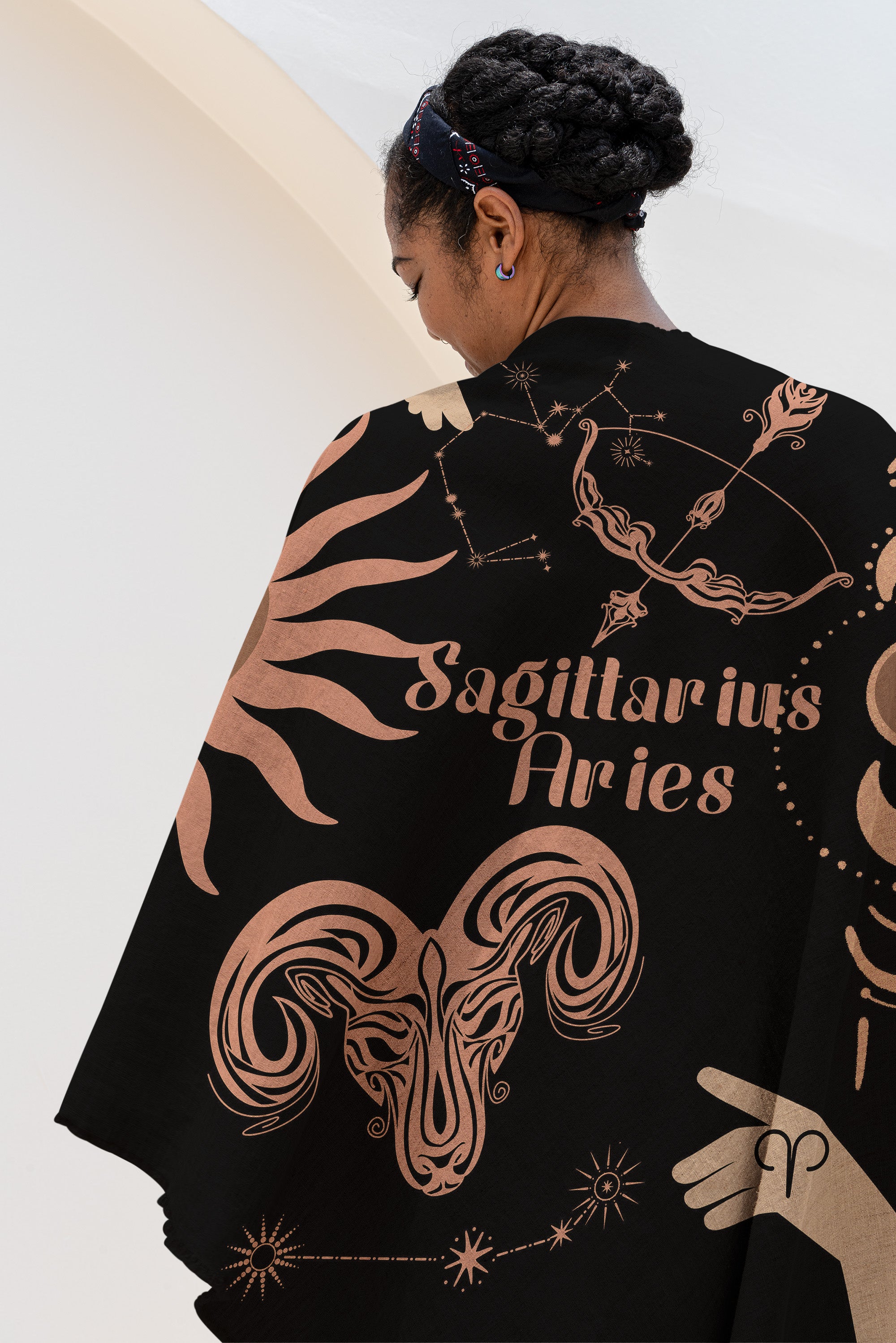 Woven tapestry throw blanket featuring the Aries and Sagittarius zodiac symbols. Perfect for astrology enthusiasts, this cotton throw blanket adds a touch of boho style and celestial charm to your home decor