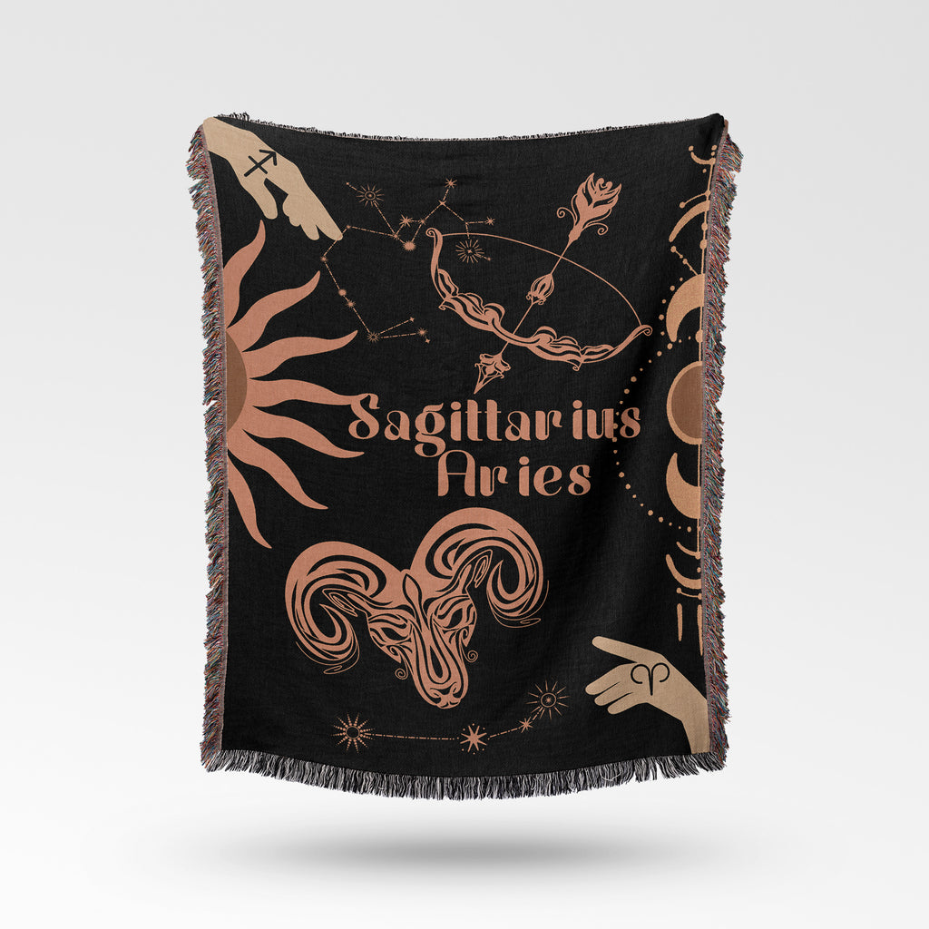 Woven tapestry throw blanket featuring the Aries and Sagittarius zodiac symbols. Perfect for astrology enthusiasts, this cotton throw blanket adds a touch of boho style and celestial charm to your home decor