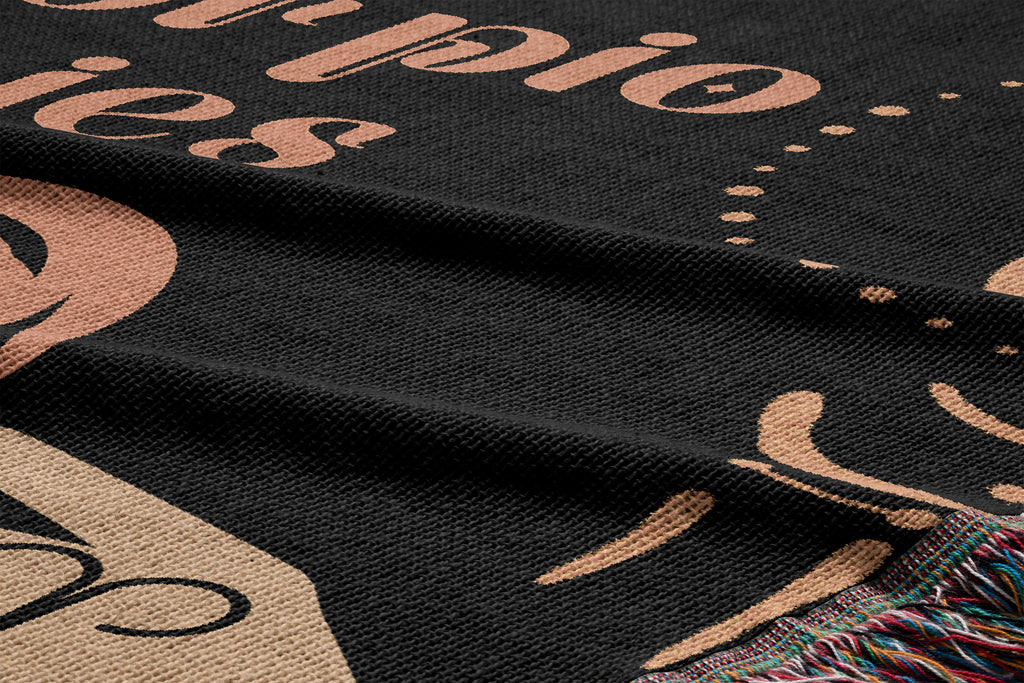 Woven tapestry throw blanket featuring the Aries and Scorpio zodiac symbols. Perfect for astrology enthusiasts, this cotton throw blanket adds a touch of boho style and celestial charm to your home decor.