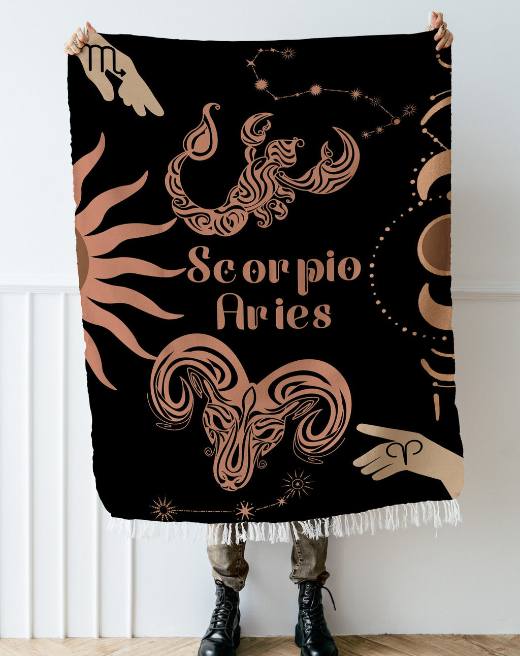 Woven tapestry throw blanket featuring the Aries and Scorpio zodiac symbols. Perfect for astrology enthusiasts, this cotton throw blanket adds a touch of boho style and celestial charm to your home decor.