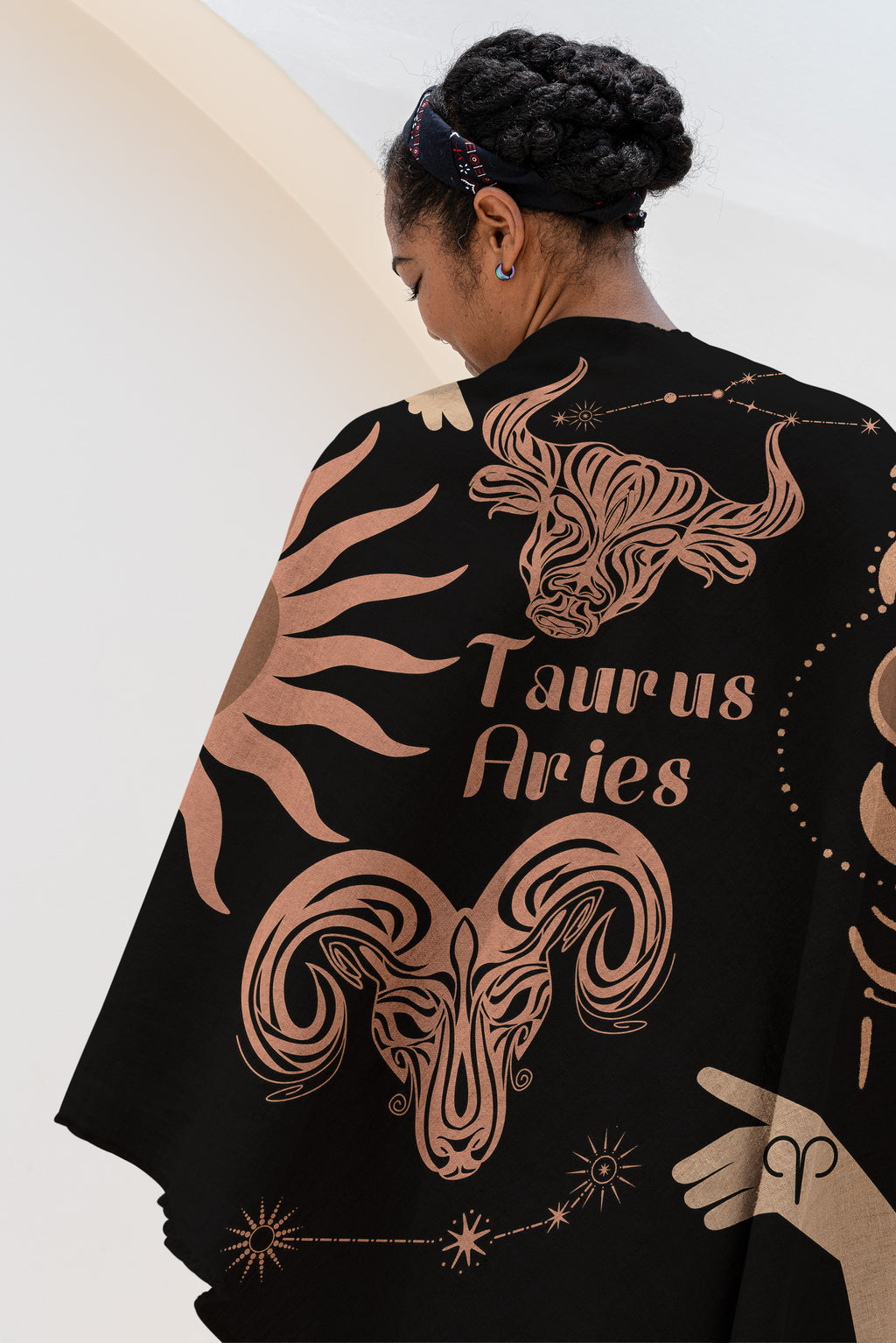 Woven tapestry throw blanket featuring the Aries and Taurus zodiac symbols. Perfect for astrology enthusiasts, this cotton throw blanket adds a touch of boho style and celestial charm to your home decor.