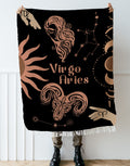 Woven tapestry throw blanket featuring the Aries and Virgo zodiac symbols. Perfect for astrology enthusiasts, this cotton throw blanket adds a touch of boho style and celestial charm to your home decor.