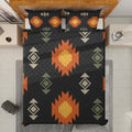 Black boho quilted bedspread and matching pillows shown from above