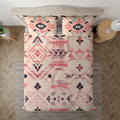 Peach geometric bedding set styled on a bedroom bed