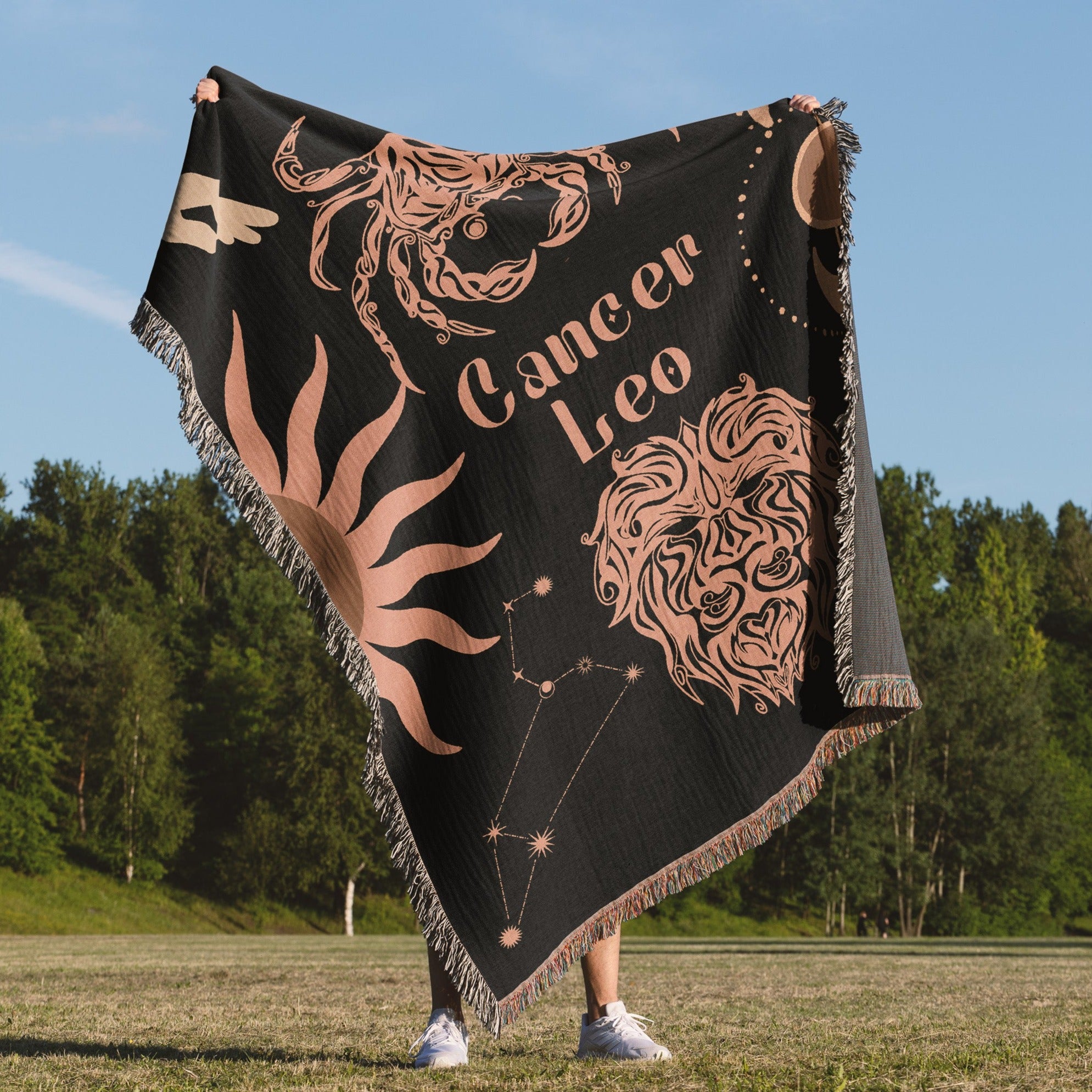 Cancer and Leo Zodiac Compatibility Woven Throw Tapestry - Elevate home decor with this boho-inspired, celestial charm blanket. Perfect for astrology enthusiasts, featuring Aries and Scorpio sun signs, adding unique, artistic flair to your living space. Premium cotton, cozy, and decorative.