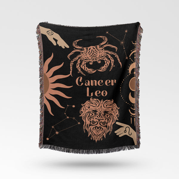 Cancer and Leo Zodiac Compatibility Woven Throw Tapestry - Elevate home decor with this boho-inspired, celestial charm blanket. Perfect for astrology enthusiasts, featuring Aries and Scorpio sun signs, adding unique, artistic flair to your living space. Premium cotton, cozy, and decorative.