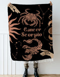 Cancer and Scorpio Zodiac Compatibility Woven Throw Tapestry - Elevate home decor with this boho-inspired, celestial charm blanket. Perfect for astrology enthusiasts, featuring Aries and Scorpio sun signs, adding unique, artistic flair to your living space. Premium cotton, cozy, and decorative.