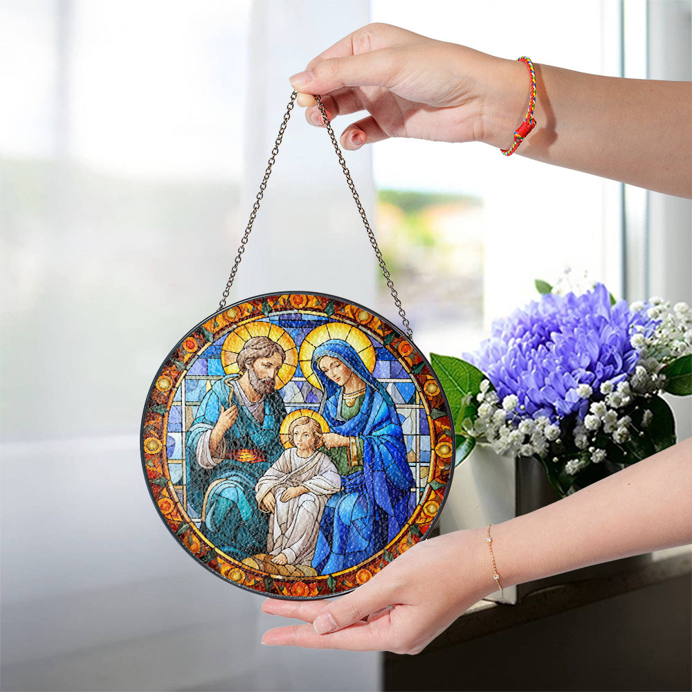 Holy Family glass suncatcher displayed as religious Christmas home decor