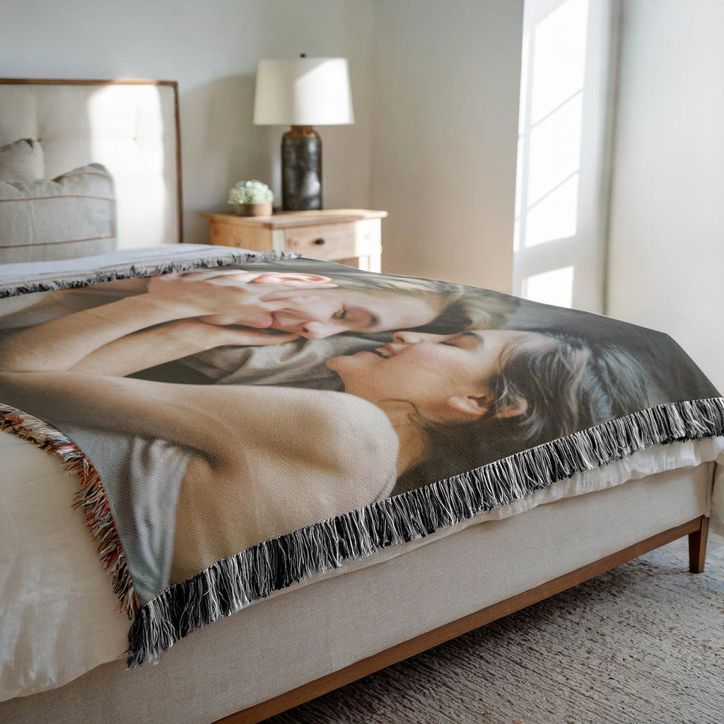 Custom couple photo blanket displayed as a decorative throw