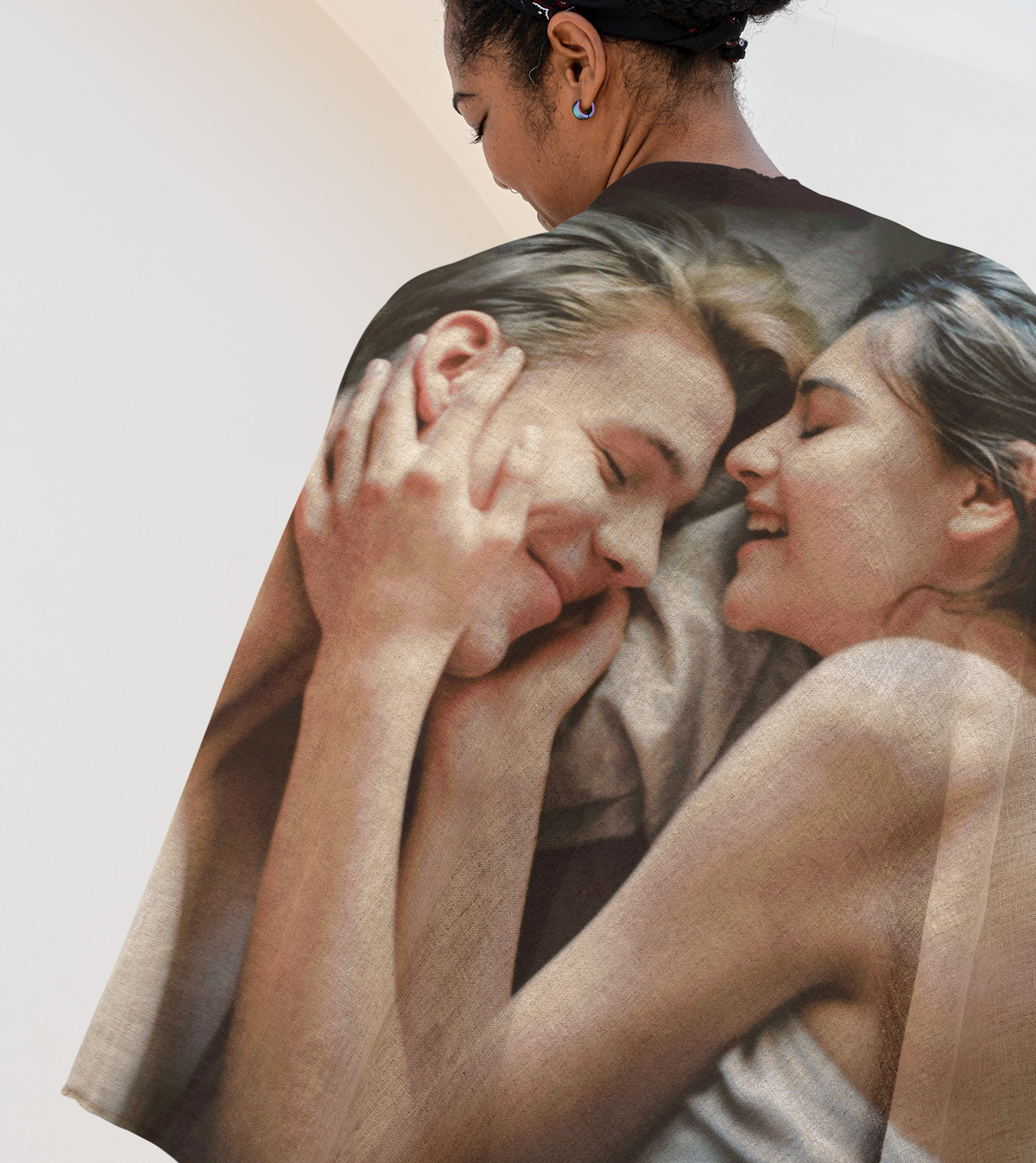 Custom couple photo blanket displayed as a decorative throw over a person