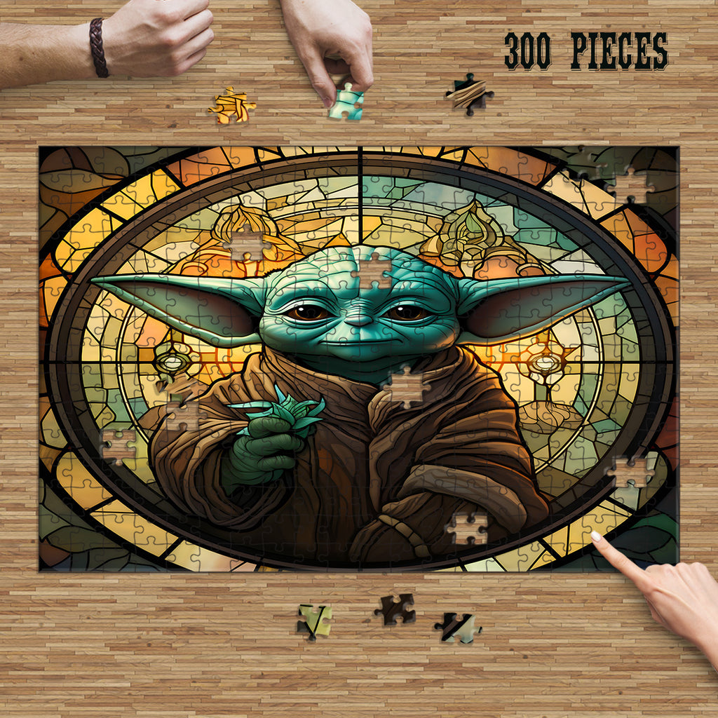 Hands assembling the 300-piece Green Fantasy Sage Stained Glass wooden jigsaw puzzle