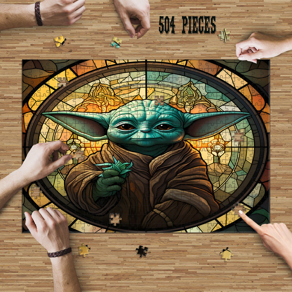 Hands assembling the 504-piece Green Fantasy Sage Stained Glass wooden jigsaw puzzle