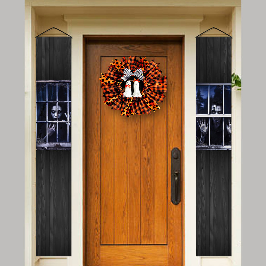 Haunted Window Halloween door banners displayed beside a front door
