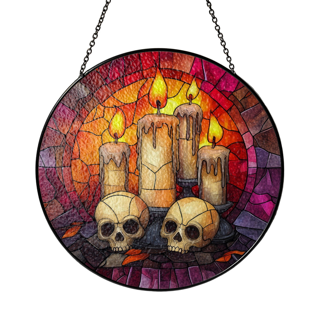 Stained glass panel with candles and skulls against a colorful background