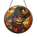 Scarecrow stained glass suncatcher with glowing eyes and autumn leaves