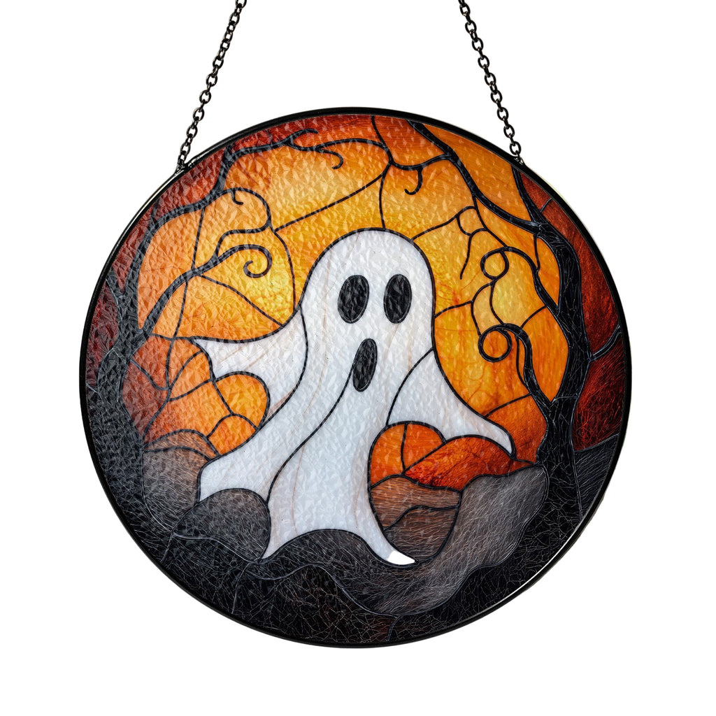 Round stained glass panel with a ghost design, hanging indoors.