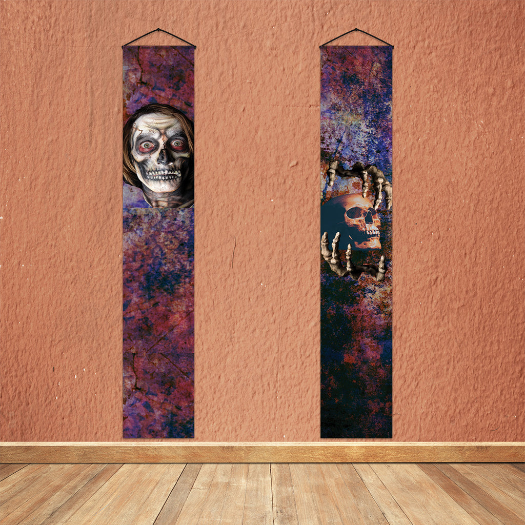 Skeletal hands holding a skull on scary Halloween door banner