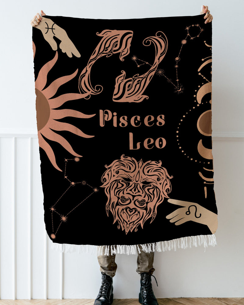 Leo and Pisces Zodiac Compatibility Woven Throw Tapestry - Elevate home decor with this boho-inspired, celestial charm blanket. Perfect for astrology enthusiasts, featuring Leo and Pisces sun signs, adding unique, artistic flair to your living space. Premium cotton, cozy, and decorative.