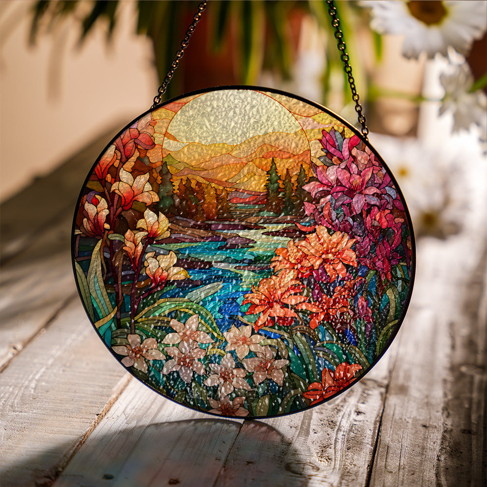 Floral sunset glass suncatcher showing textured surface and light reflection