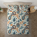 Soft Pastel Paisley bedding displayed at an angle on a bed